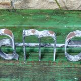 Former hairdresser sign "dames" in metal