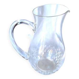 Crystal pitcher engraved with petals