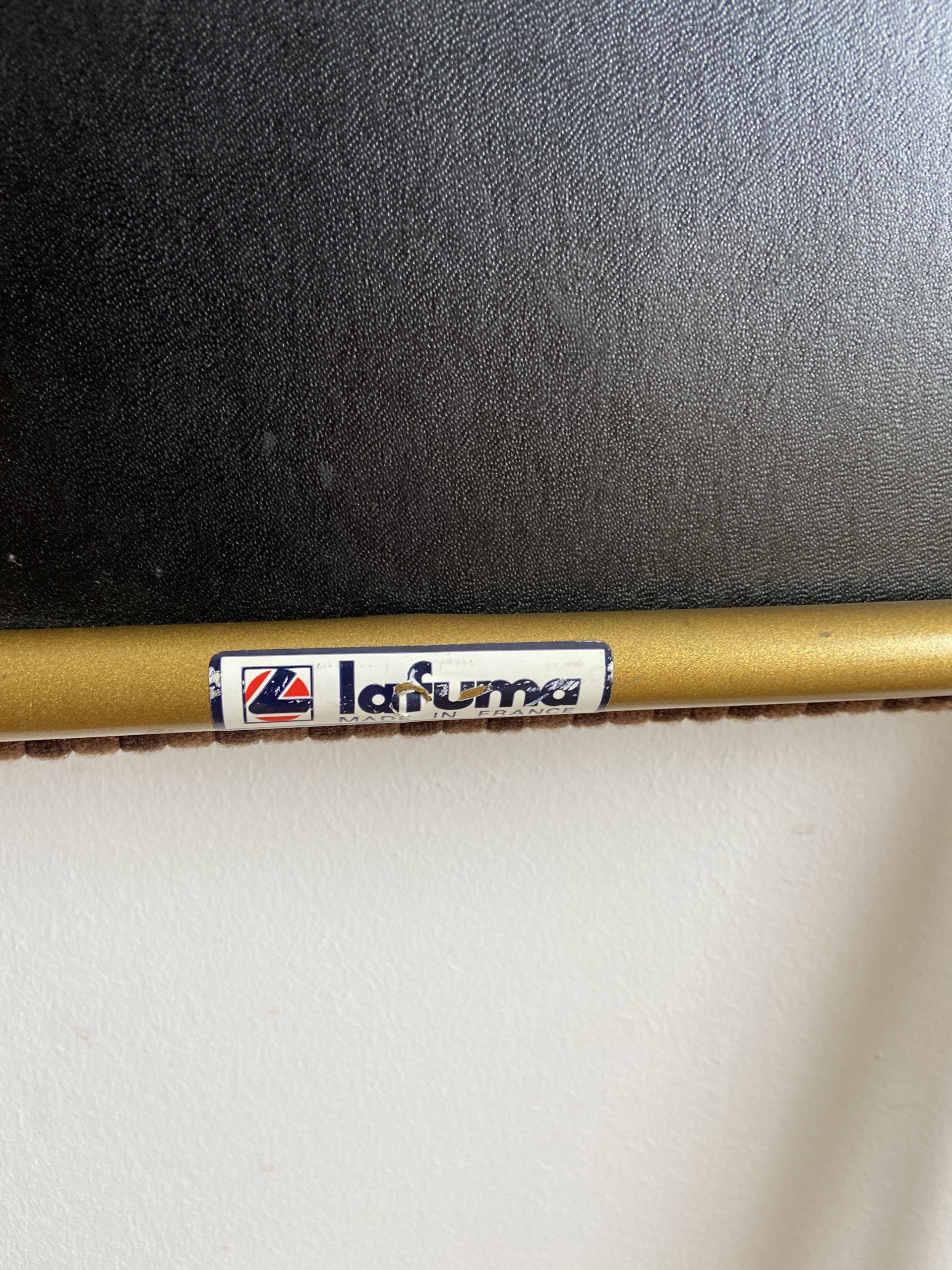 Vintage folding chair lafuma with brown checkered fabric