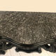 Pair of blackened wooden consoles, marble top