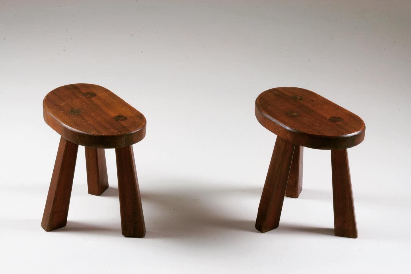 Pair of tripod brutalist stools, France 1950s