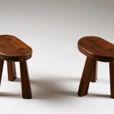 Pair of tripod brutalist stools, France 1950s