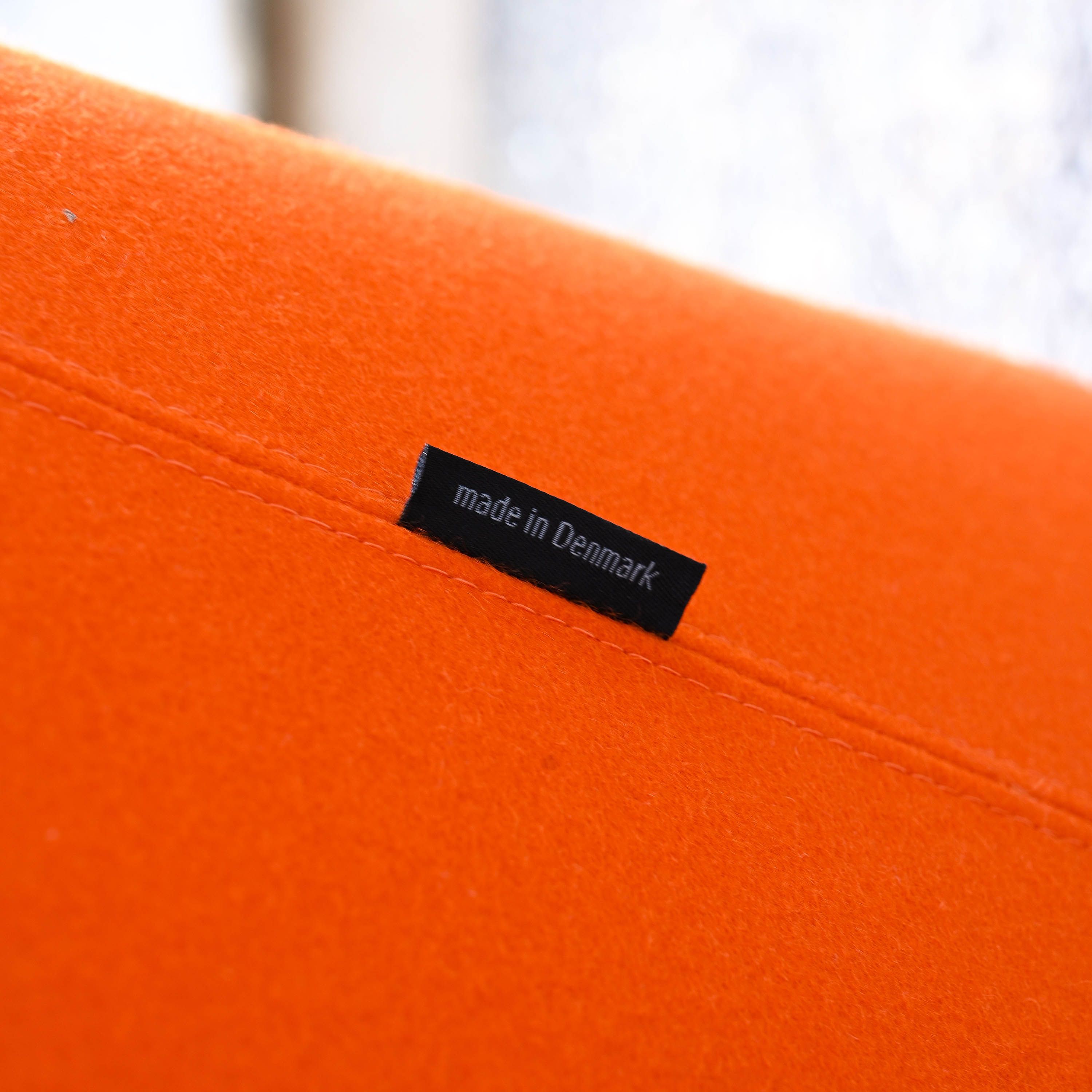 Havana Wing Chair in orange Divina fabric designed by Busk & Hertzog in 2013