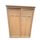 Large antique wardrobe in raw wood