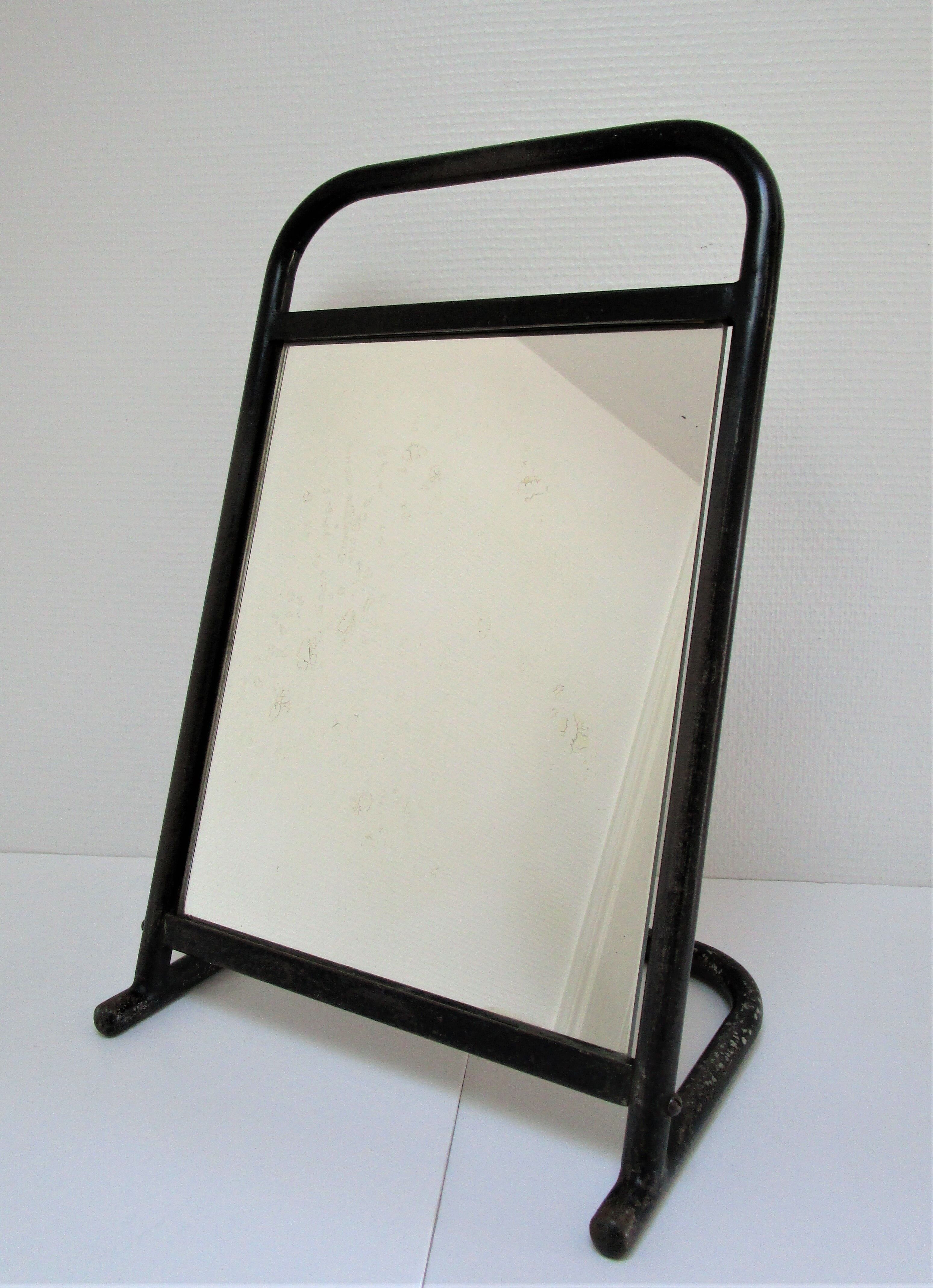 Vintage patinated metal shoe mirror