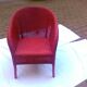Fauteuil vintage en rotin rouge