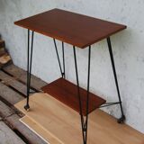 Tv furniture, a table with teak wheels and Scandinavian-style metal.