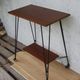 Tv furniture, a table with teak wheels and Scandinavian-style metal.
