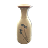 Stoneware carafe with floral decoration