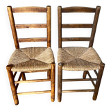 Set of wooden and straw chairs