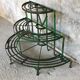 Metal half-moon plant holder - twentieth century
