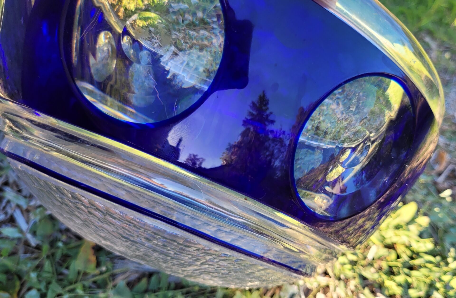 cobalt blue glass bowl with round lenses