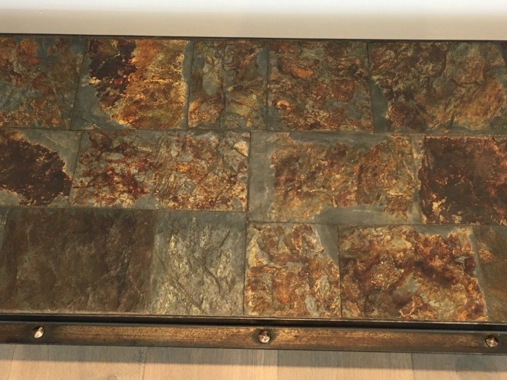 Rare coffee table in steel and wrought iron with a top made of lava stones