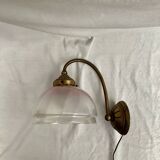 Brass wall light with a glass globe dimension: height -21cm- width -27cm-