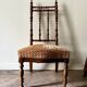 Turned wood and ochre velvet chair