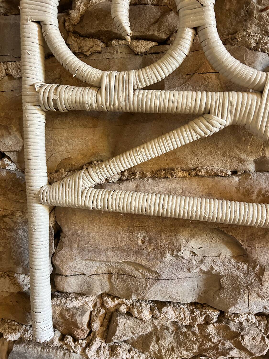 Peacock style white rattan headboard