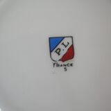 Old large tea cup and saucer in Limoges porcelain with flower decor