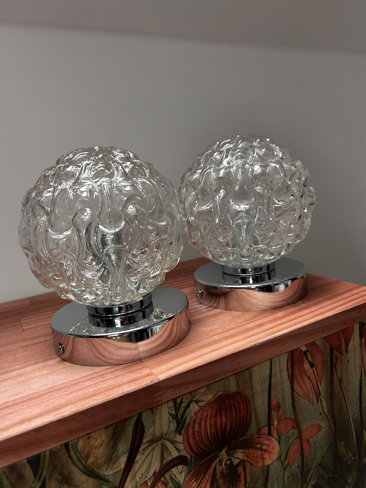 Pair of vintage glass globe chrome wall lights