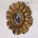 Miroir soleil en bois doré 1950