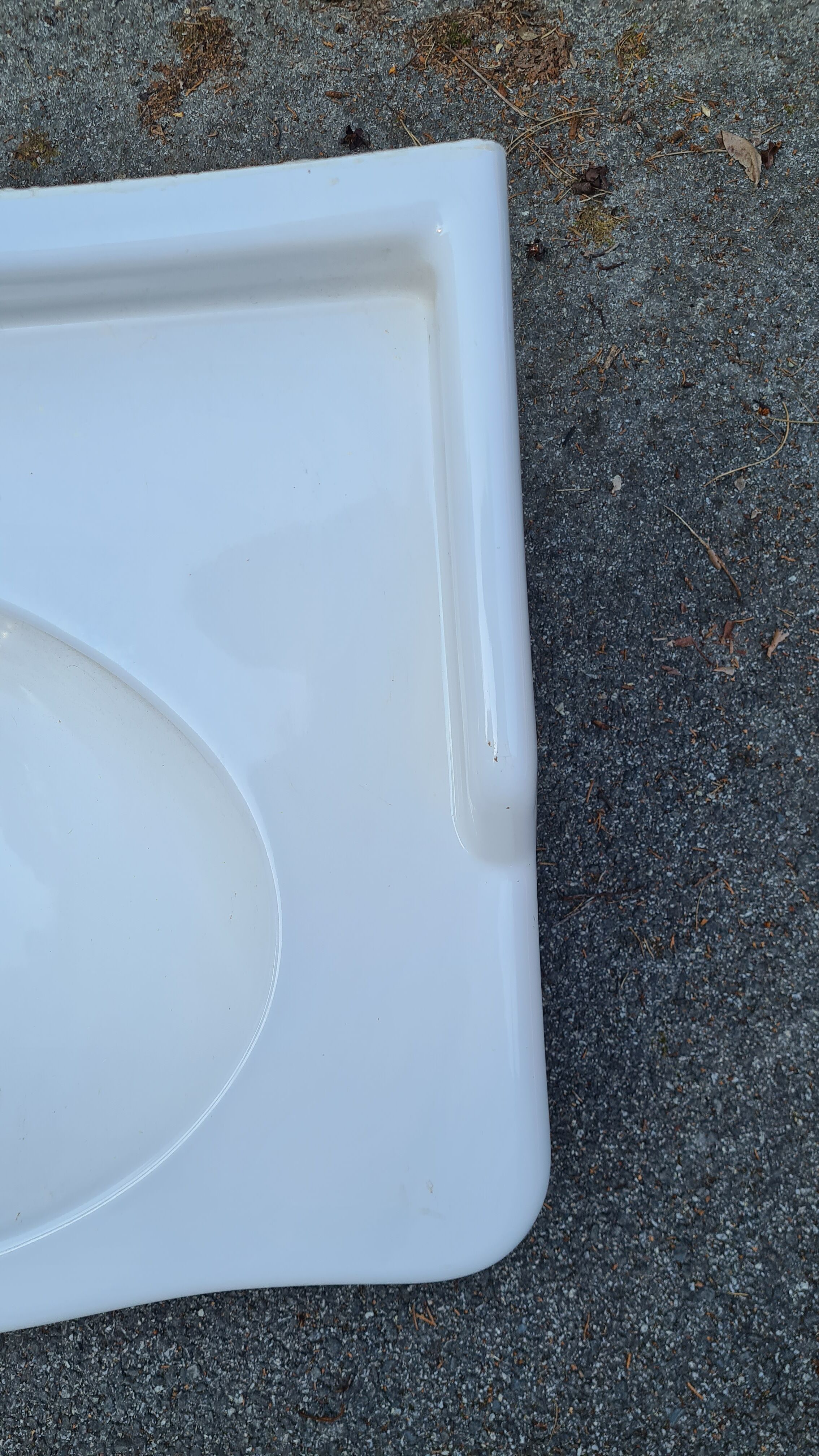 White ceramic wall washbasin with 2 ceramic legs