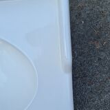 White ceramic wall washbasin with 2 ceramic legs