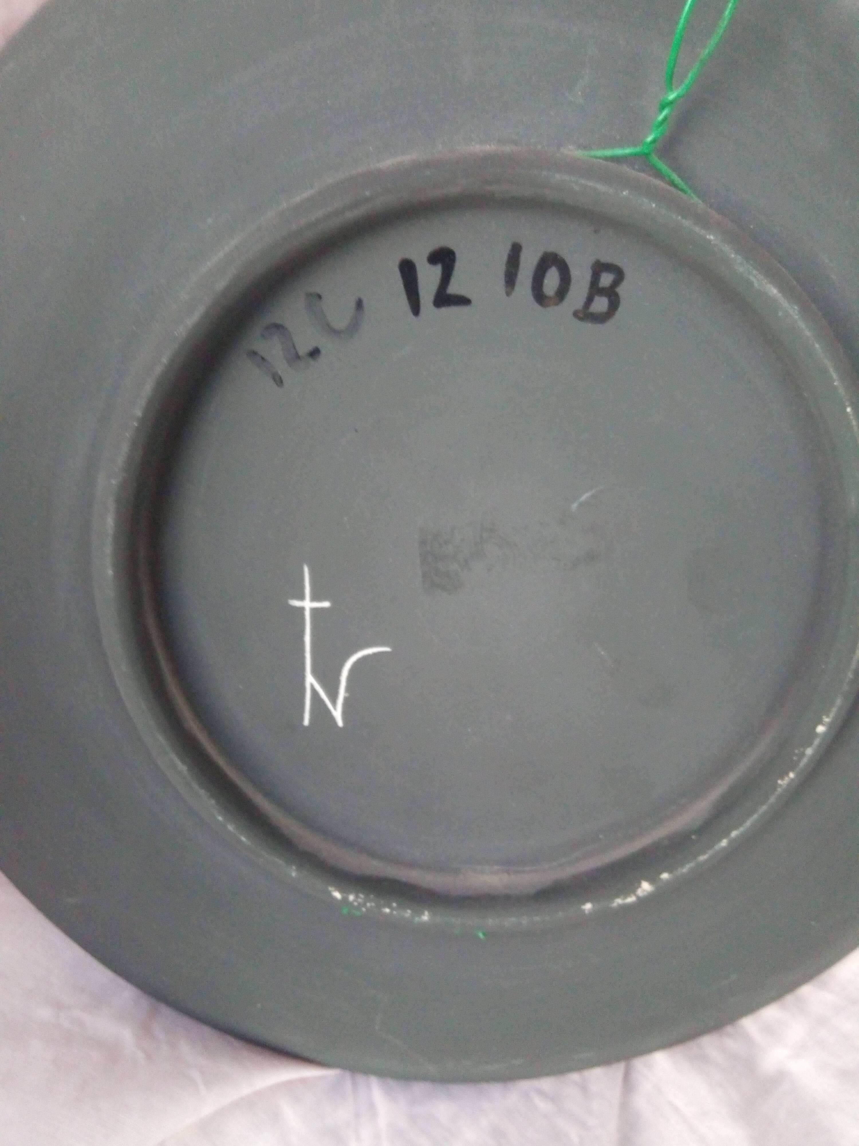 Rare pair of ceramic plates and enamel with mythological decoration. The 50s.