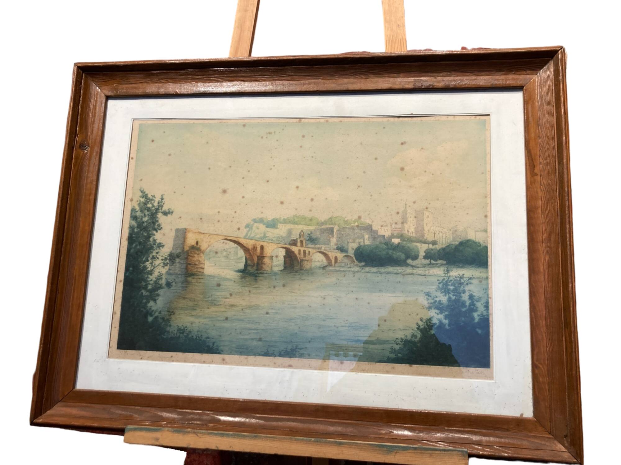 Framed engraving of a landscape