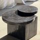 Brown petrified wood coffee table from Indonesia with a double circular top.