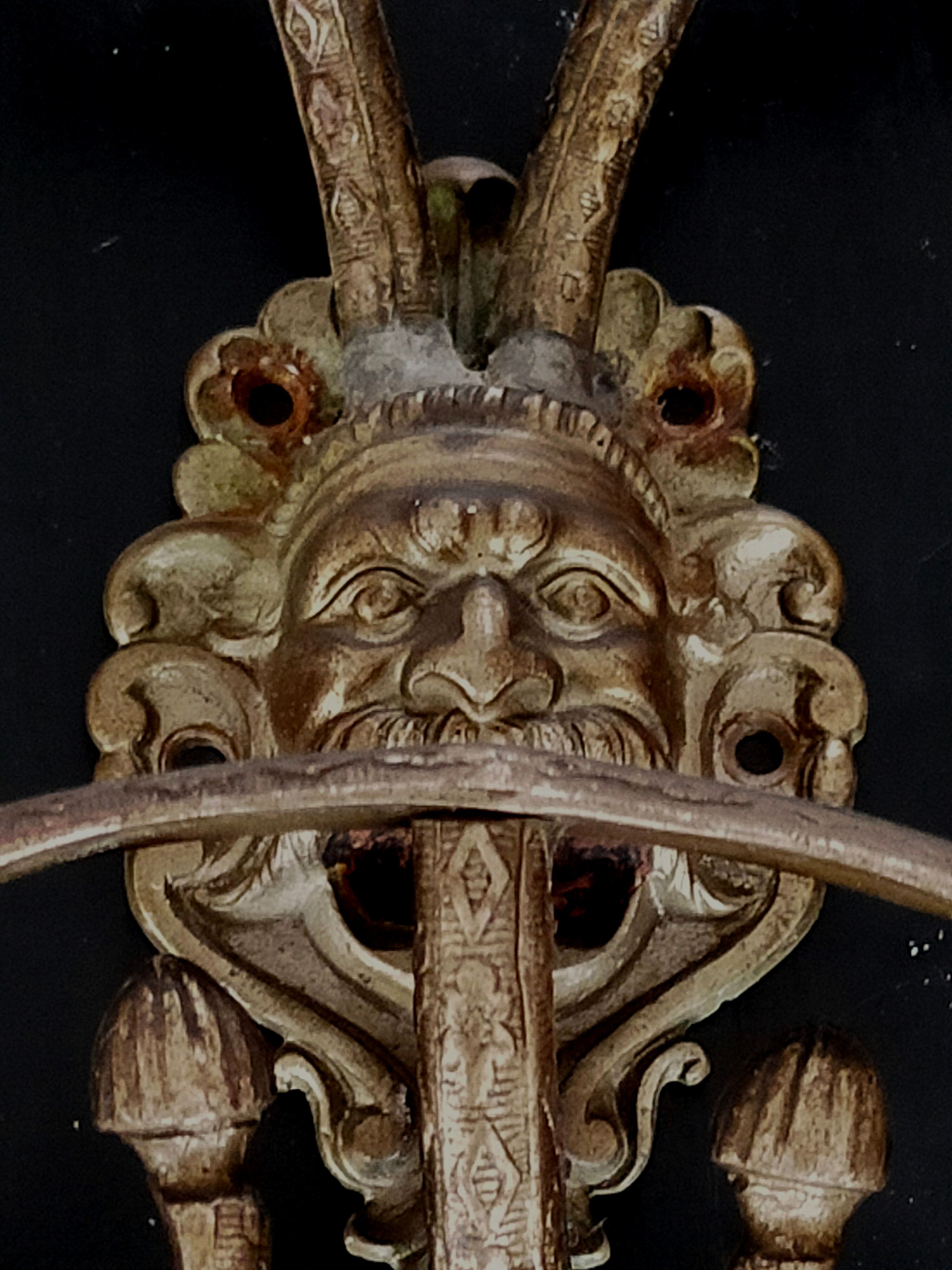 Set of 4 bronze mascaron hooks