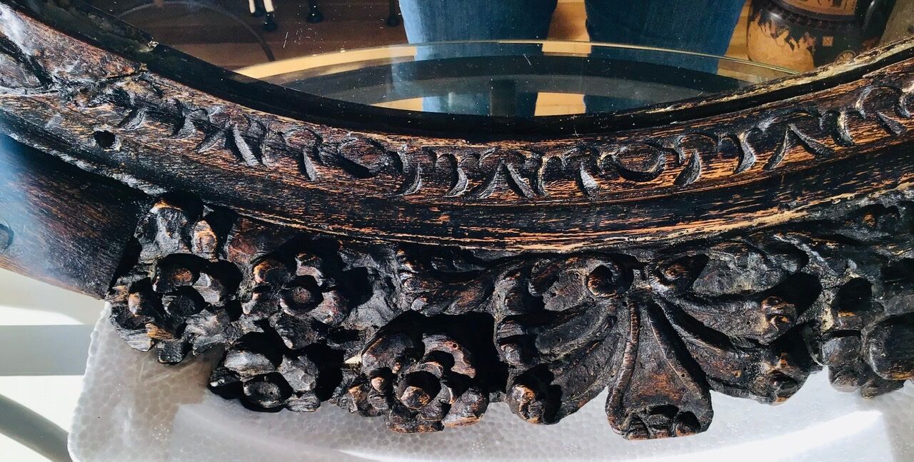 Oval mirror on an 18th century frame