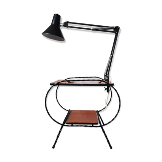 Table serves bedside with this lamp