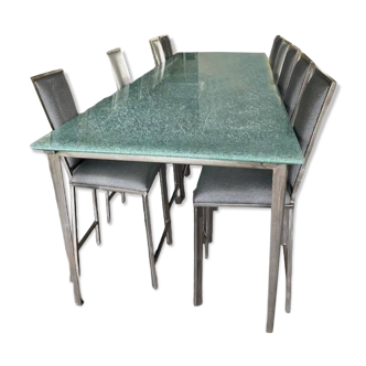 Steel and slammed glass table and 12 chairs