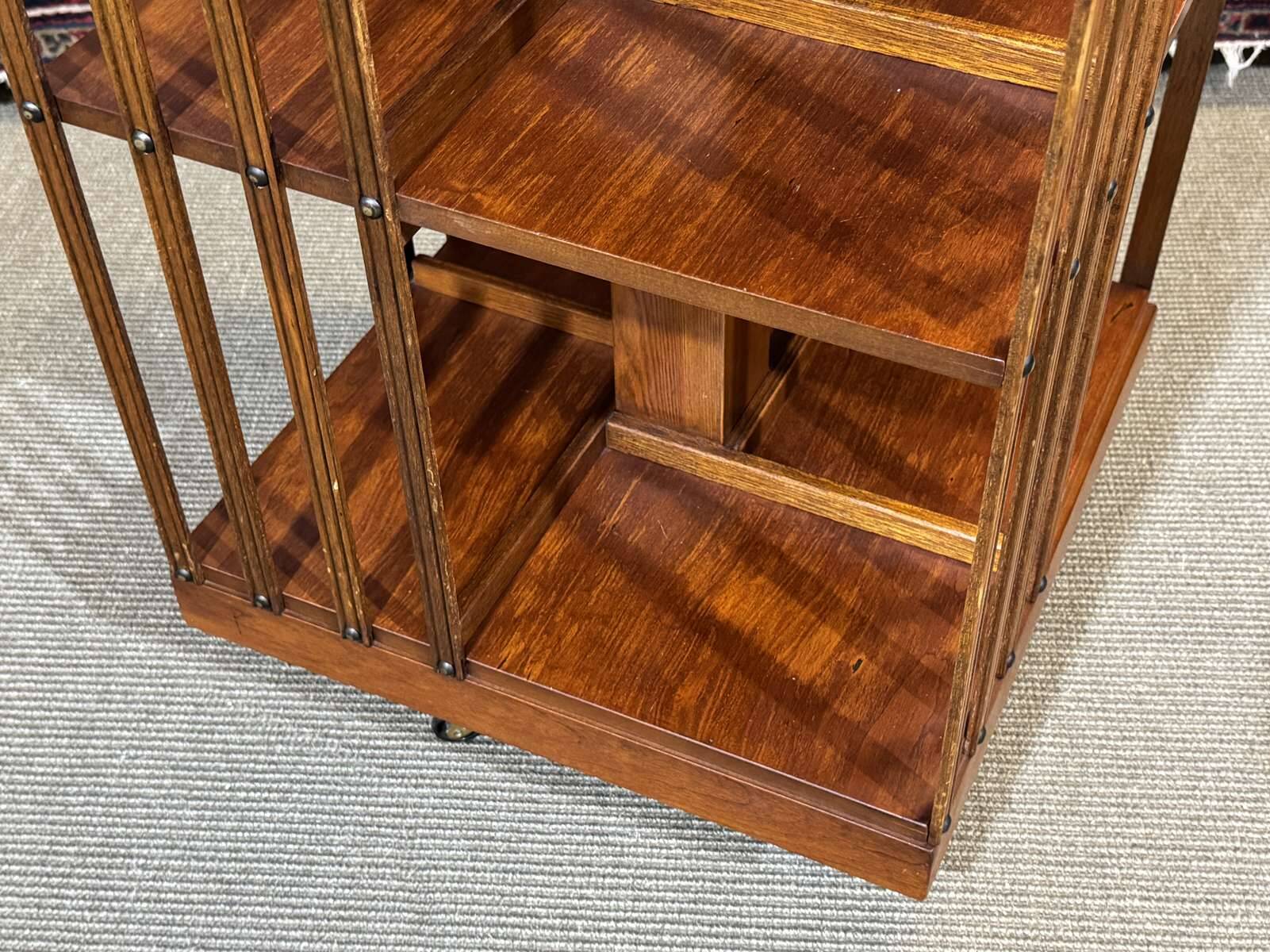 1970s English revolving library in fir