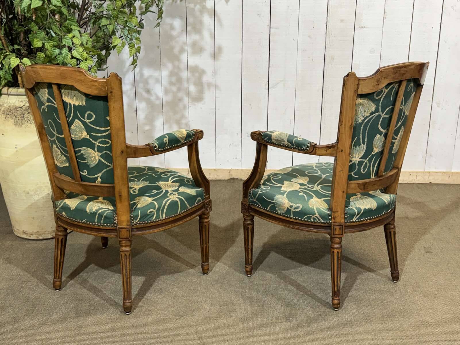 Pair of Louis XVI style armchairs in beech from the 19th century.