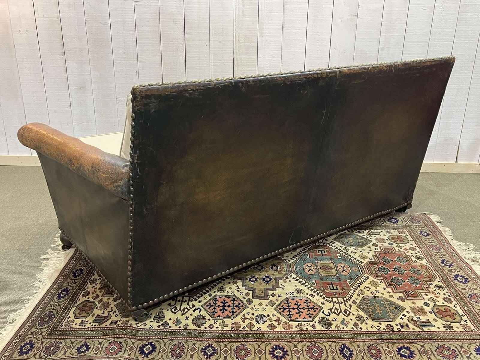 Early 20th century leather club sofa - seat and back in modern fabric