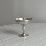 Silver-plated metal bowl on a stand