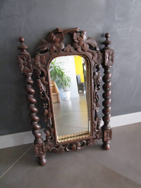 Antique carved wooden mirror