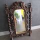 Antique carved wooden mirror