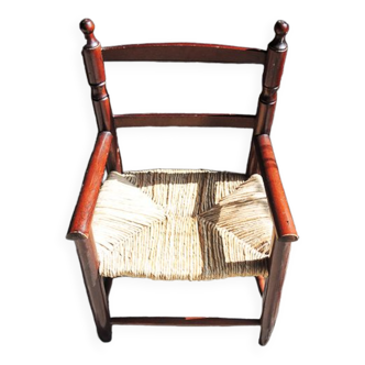 Old children's armchair in wood & straw