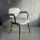 Skai armchair and black metal compass legs, 1960s