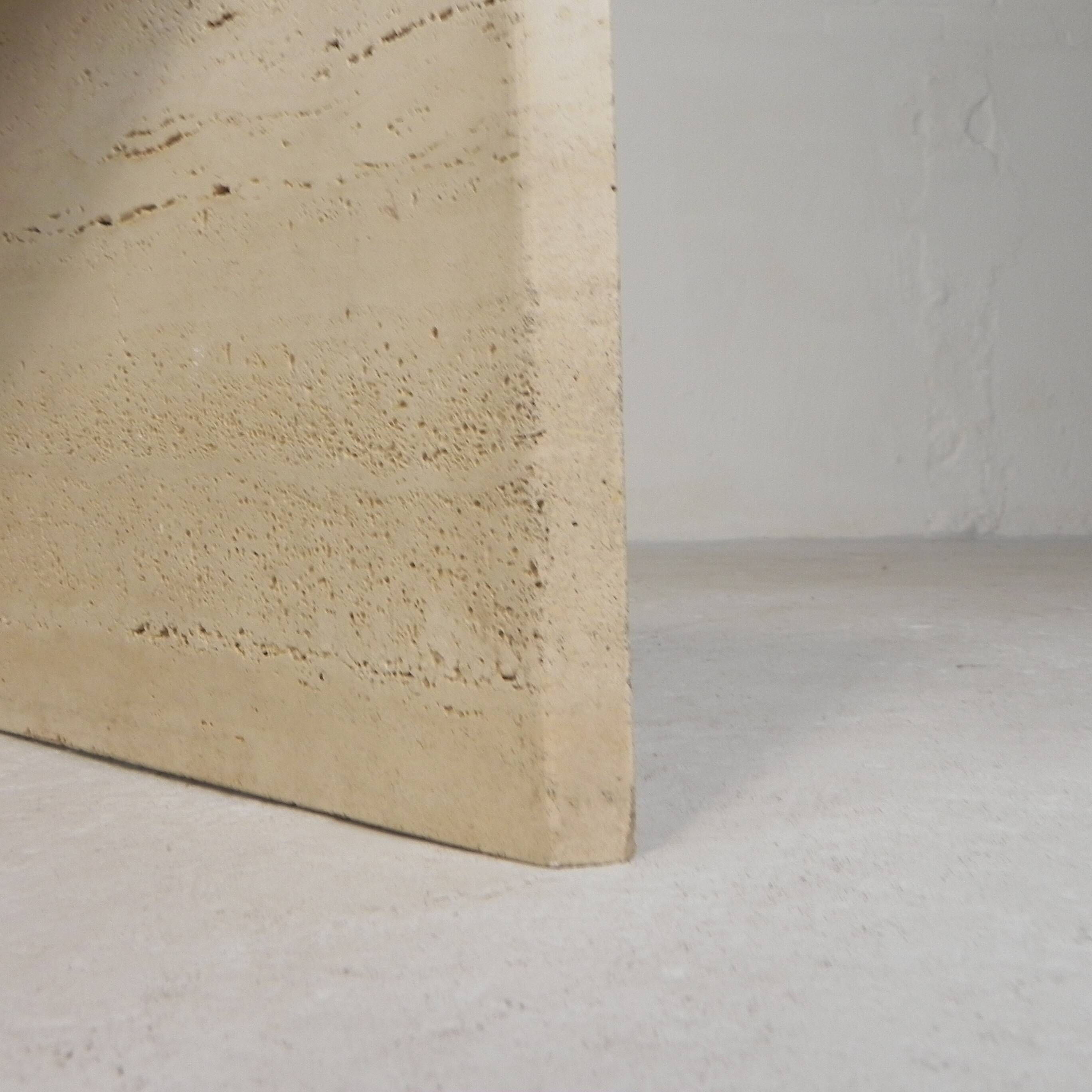 Mid-Century travertine coffee table with a triangular top, 1970s.