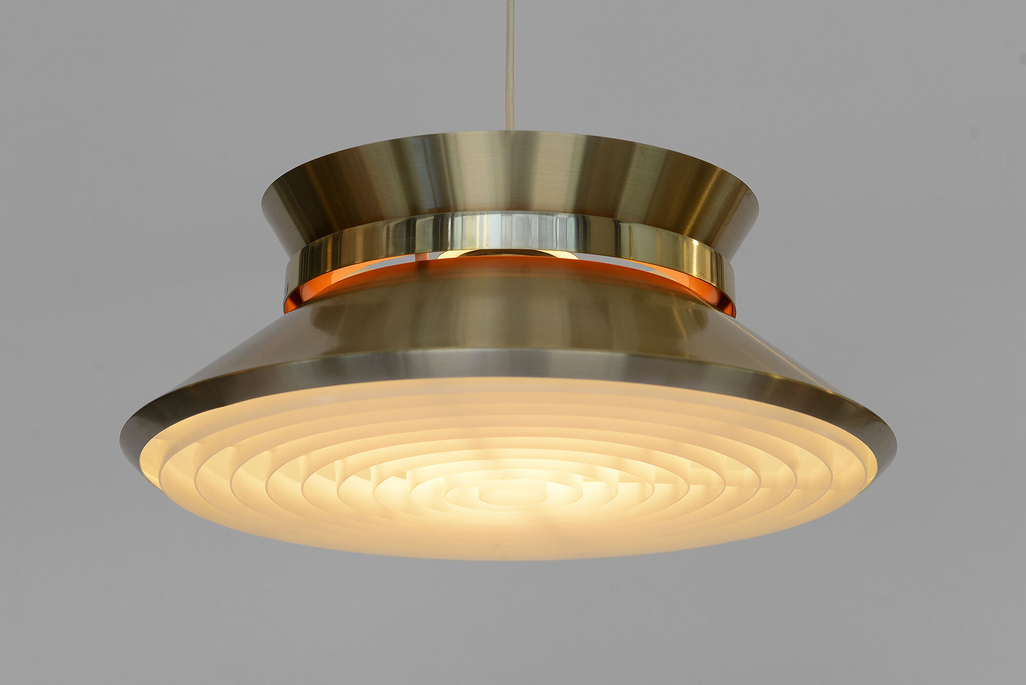 Brass colored aluminium pendant light by Carl Thore for Granhaga Metall. Sweden 1970s.