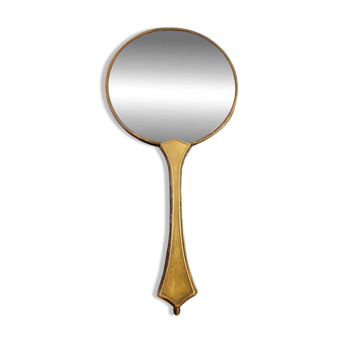 Brass hand mirror with magnifying back