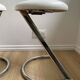 Pair of vintage Z low stools with chrome metal base and white skai seat. H: 49 cm 80s