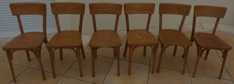 6 vintage Baumann wooden bistro chairs in their patina