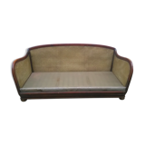 Former caned wood sofa