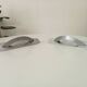 Pair of vintage brushed aluminum furniture handles
