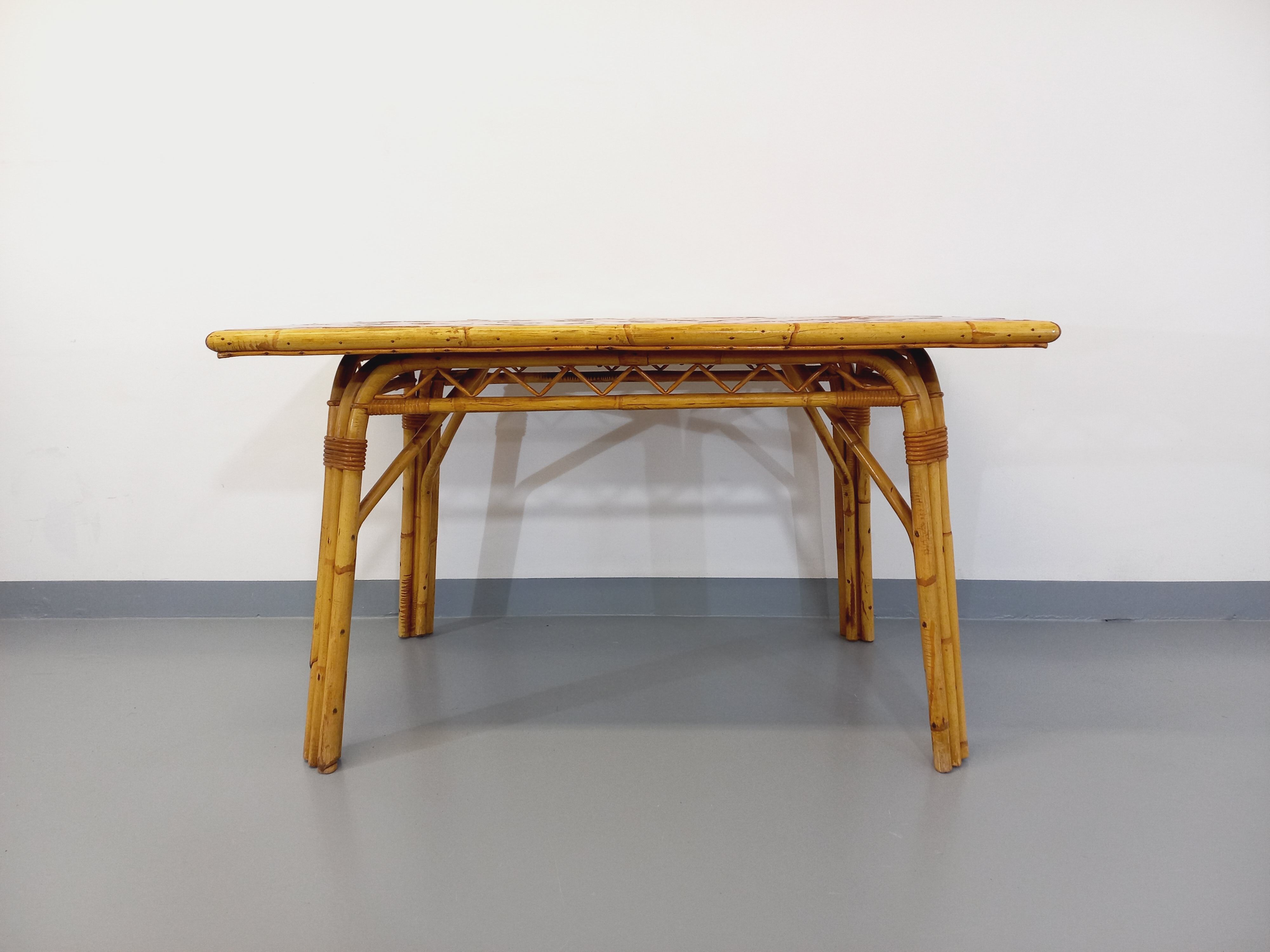 Vintage dining table in rattan and ceramic from Vallauris from the 50s and 60s