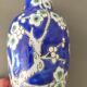 Vase céramique bleu avec décor branches de cerisier