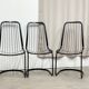 4 black wire metal chairs